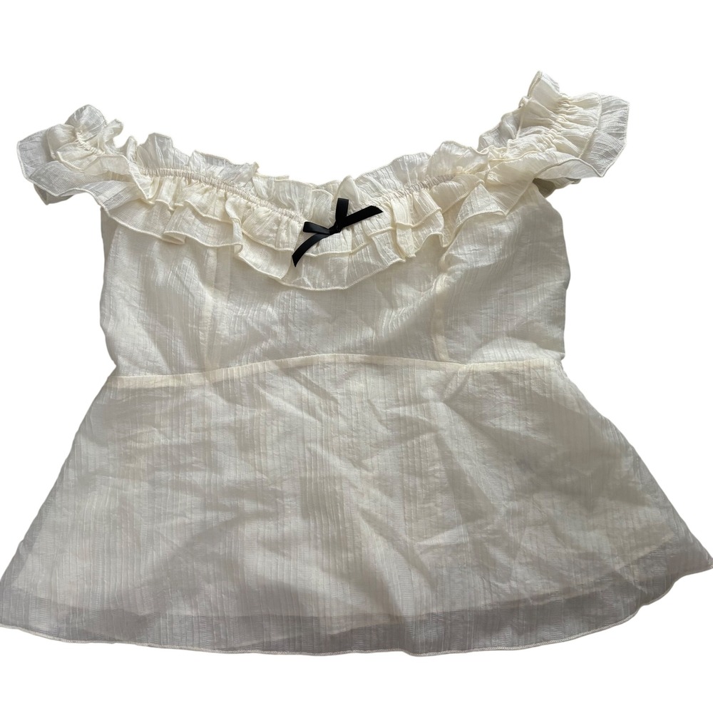 Cream Off The Shoulder Ruffle Peplum Top with Black Bow Accent Smocked Back